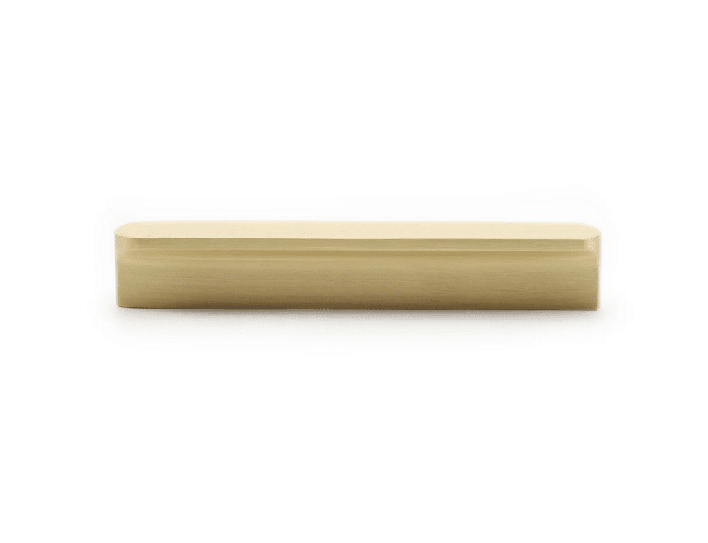 Flush pull cavity slider in brushed brass