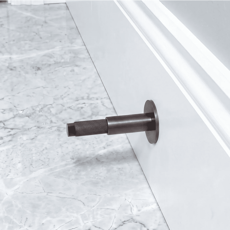 Corner shaving cabinet door stop